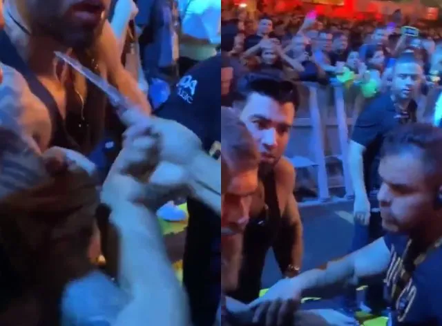 Gusttavo Lima tem colar roubado por fã durante show e se choca; veja reação